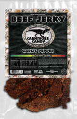 Carnivore Candy PNW packaging of Garlic Pepper Beef Jerky features visible pieces of jerky through a clear window.
