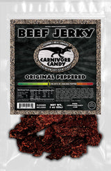 Carnivore Candy PNW packaging of Original Peppered Beef Jerky features visible pieces of jerky through a transparent window.