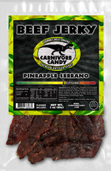 Carnivore Candy PNW packaging of Pineapple Serrano Beef Jerky shows the product name and pieces of jerky in front.