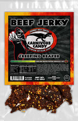 Carnivore Candy PNW packaging of Creeping Reaper Beef Jerky features a product image and brand logo with a fiery background design.